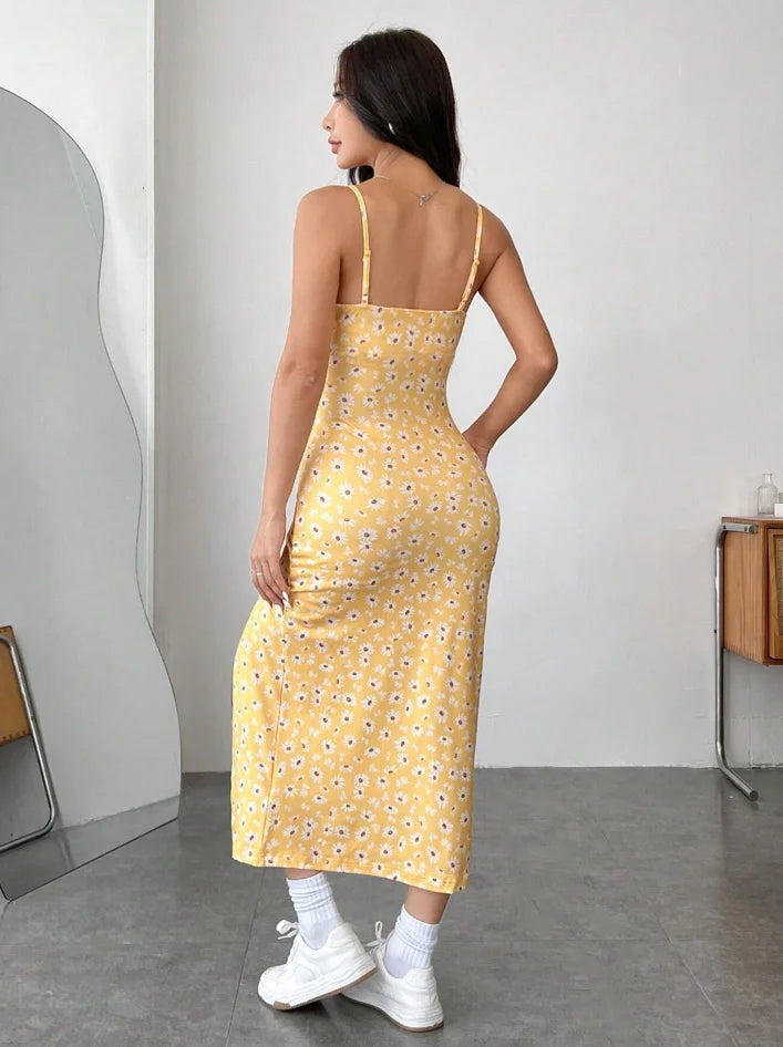 Robe longue bustier avec fente haute et imprimé léopard marguerite, de la collection Automne 2025.